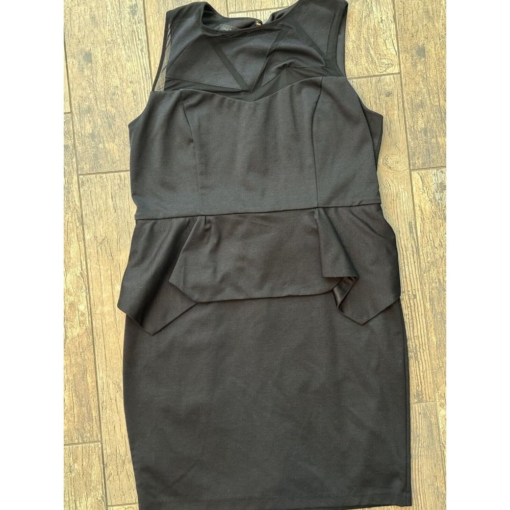 Thalía Sodi XL Sleeveless Solid Peplum Black Dress